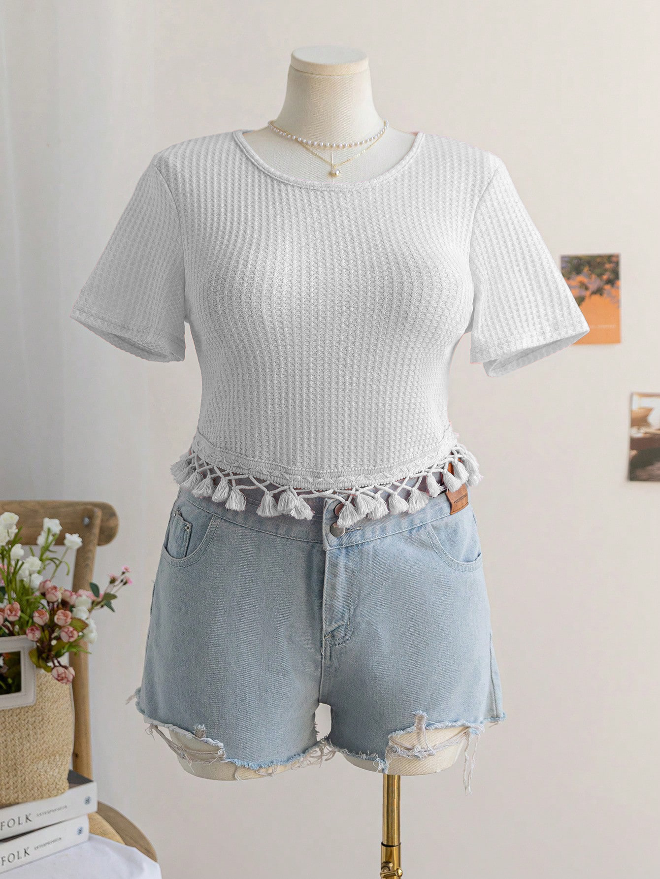 Blusa manga corta con dobladillo con flecos