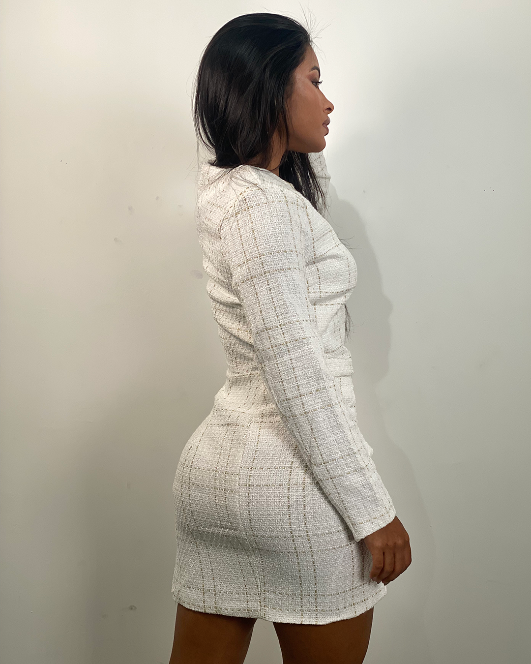Conjunto elegante con diseño de botones