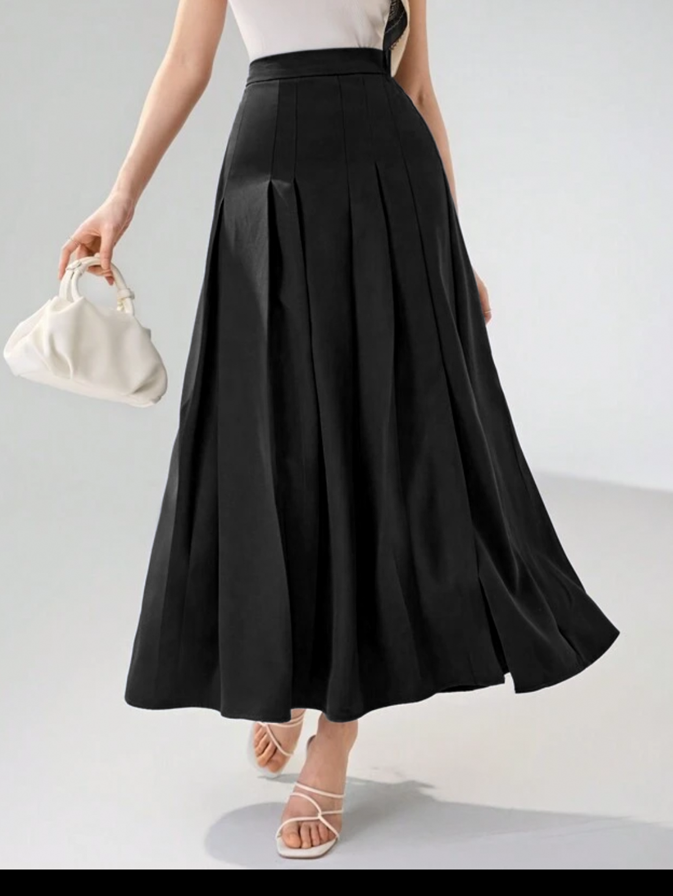 Falda larga plizada con broche y cierre