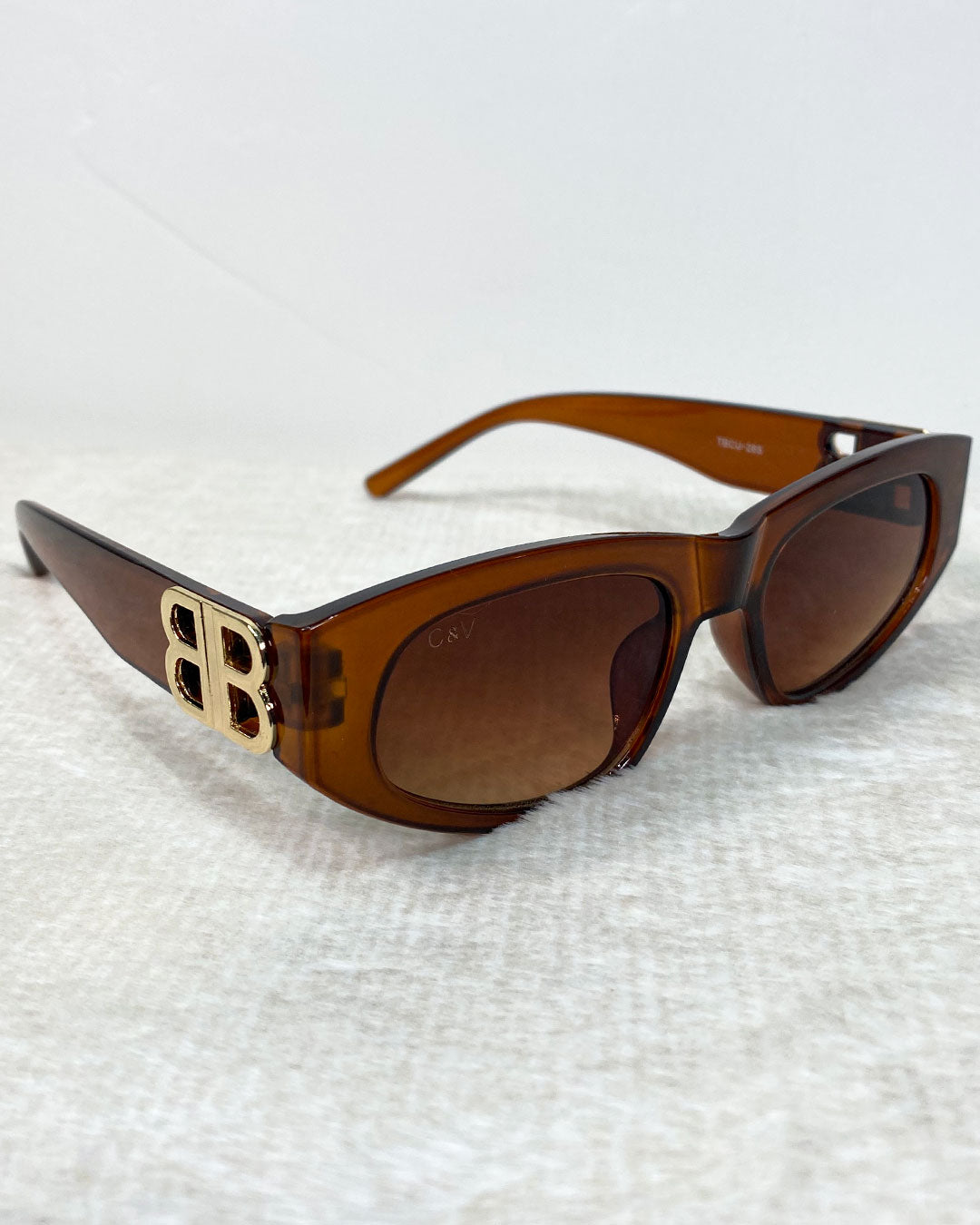 Gafas de sol de dama con detalle dorado