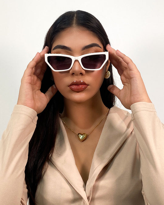 Gafas retro con detalle dorado