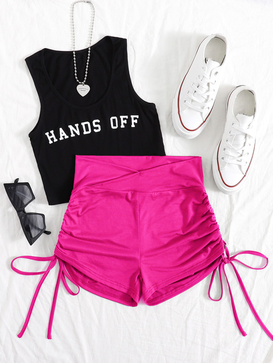 Shorts de licra unicolor con cordones laterales