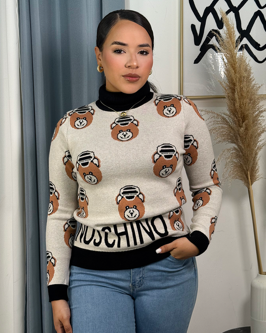 Sueter con tejido cuello alto con diseño de mochino
