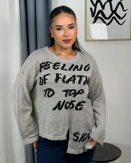 Sueter jersey tejido con diseño rasgado