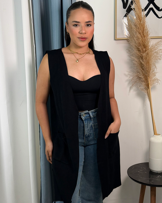 Sobretodo tejido largo sin mangas