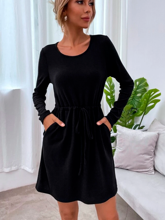 Vestido teijdo manga tres cuartas con bolsillos