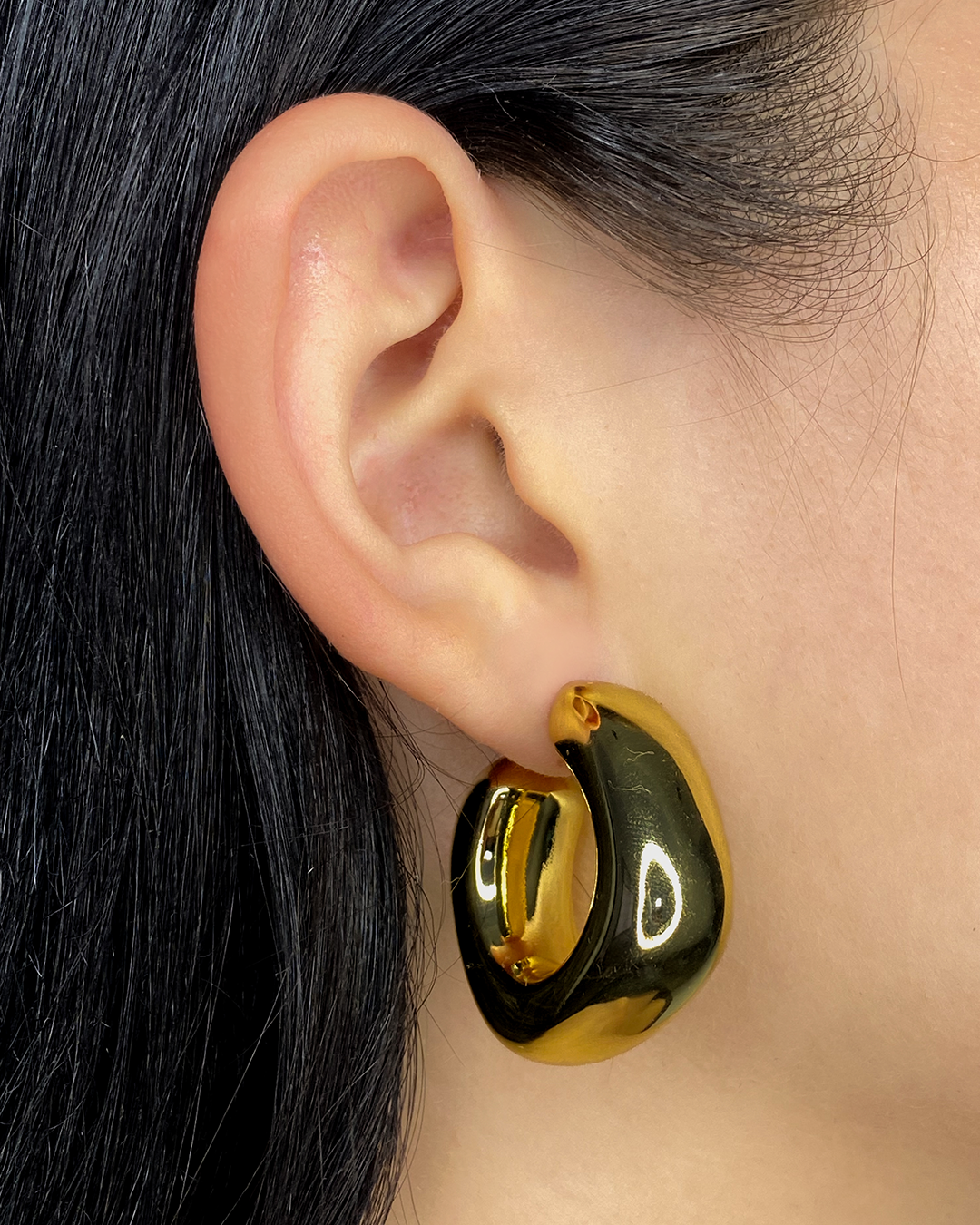 Argollas semi cuadradas enchapado en oro 18k acero inoxidable