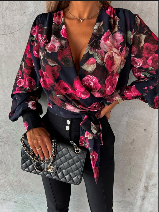 Blusa con estampado floreado manga larga
