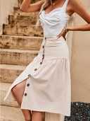 Falda media larga unicolor con botones delantero