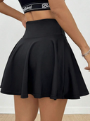 Falda short unicolor deportiva