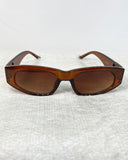 Gafas de sol de dama con detalle dorado