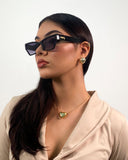 Gafas retro con detalle dorado