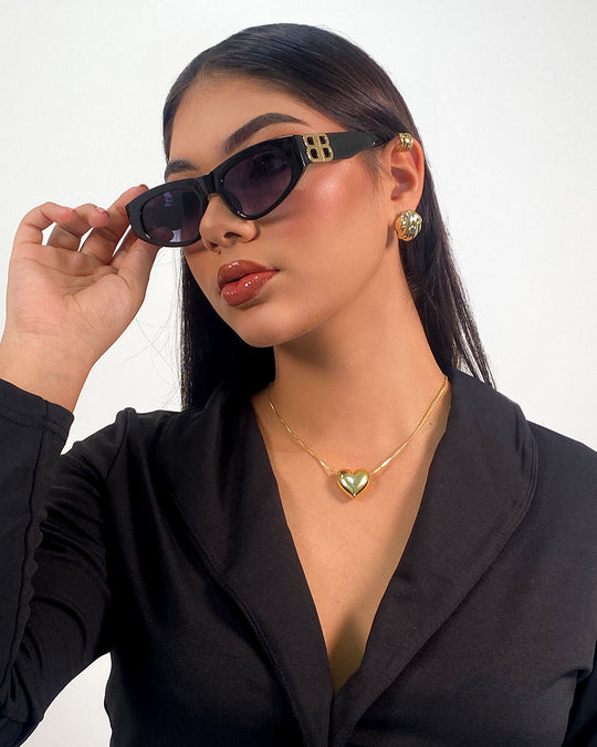 Gafas de sol de dama con detalle dorado