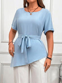 Blusa unicolor elegante con cinturon
