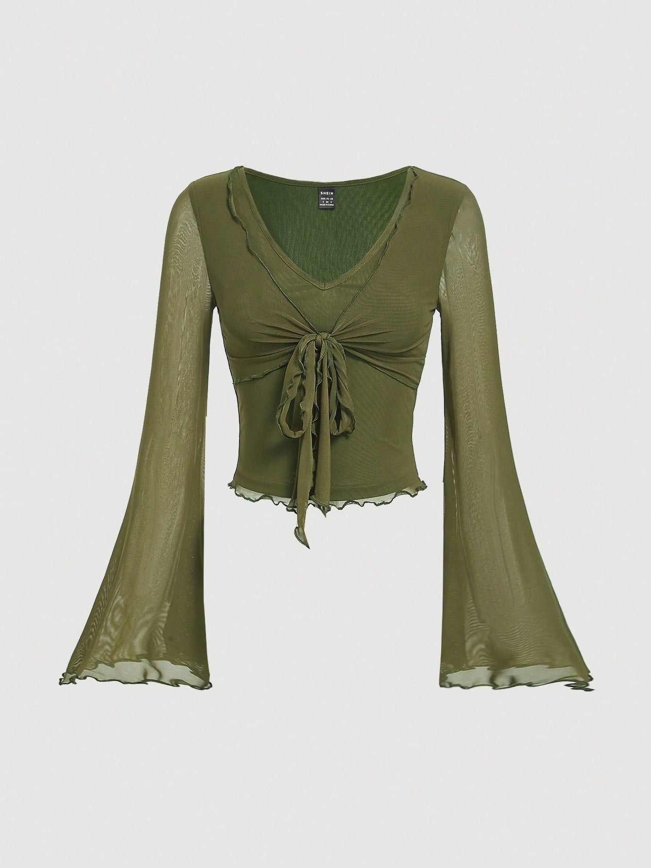 Sueter manga larga con detalle de nudo en el frente