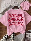 Camiseta unicolor con diseño grafico grande en la parte trasera