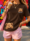 Franela unicolor con diseño impreso de oso