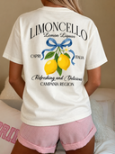 Franela unicolor con diseño impreso de limón en la parte trasera