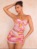 Conjunto de corset y falda corta con malla