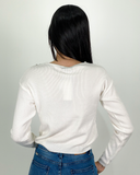 Sueter jersey con pedrería