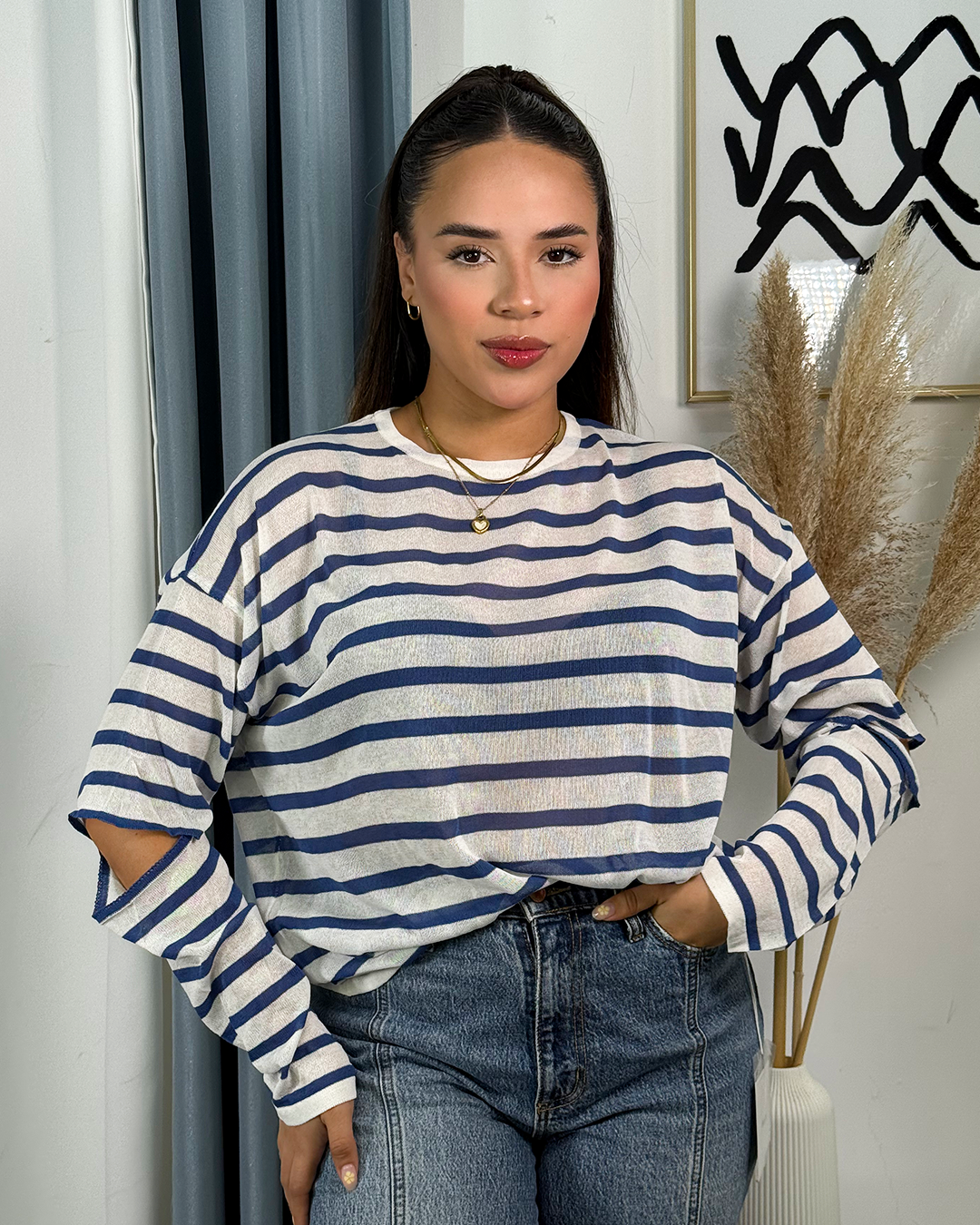 Sueter jersey tejido con aberturas