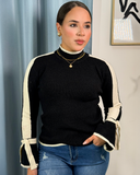 Sueter tejido con franjas y lazos