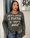 Sueter jersey tejido con diseño rasgado