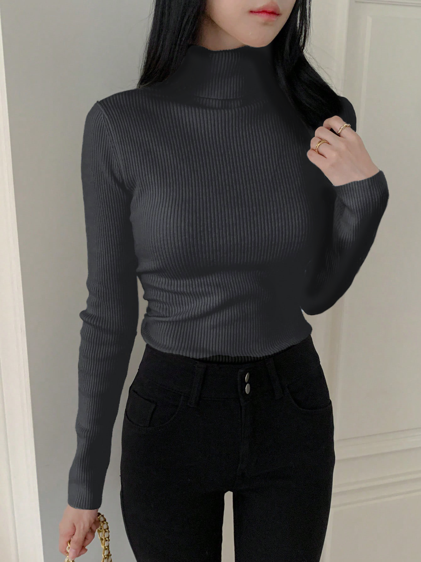 Sueter acanalado cuello alto