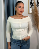 Sueter tejido hombros al aire unicolor