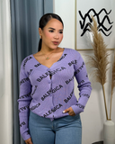 Sueter tejido estampado con botones