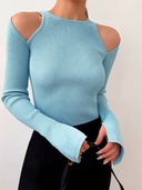 Sueter teijdo con abertura en hombros y mangas