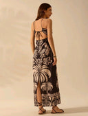 Vestido largo con estampado tropical con cuello de lazo hueco