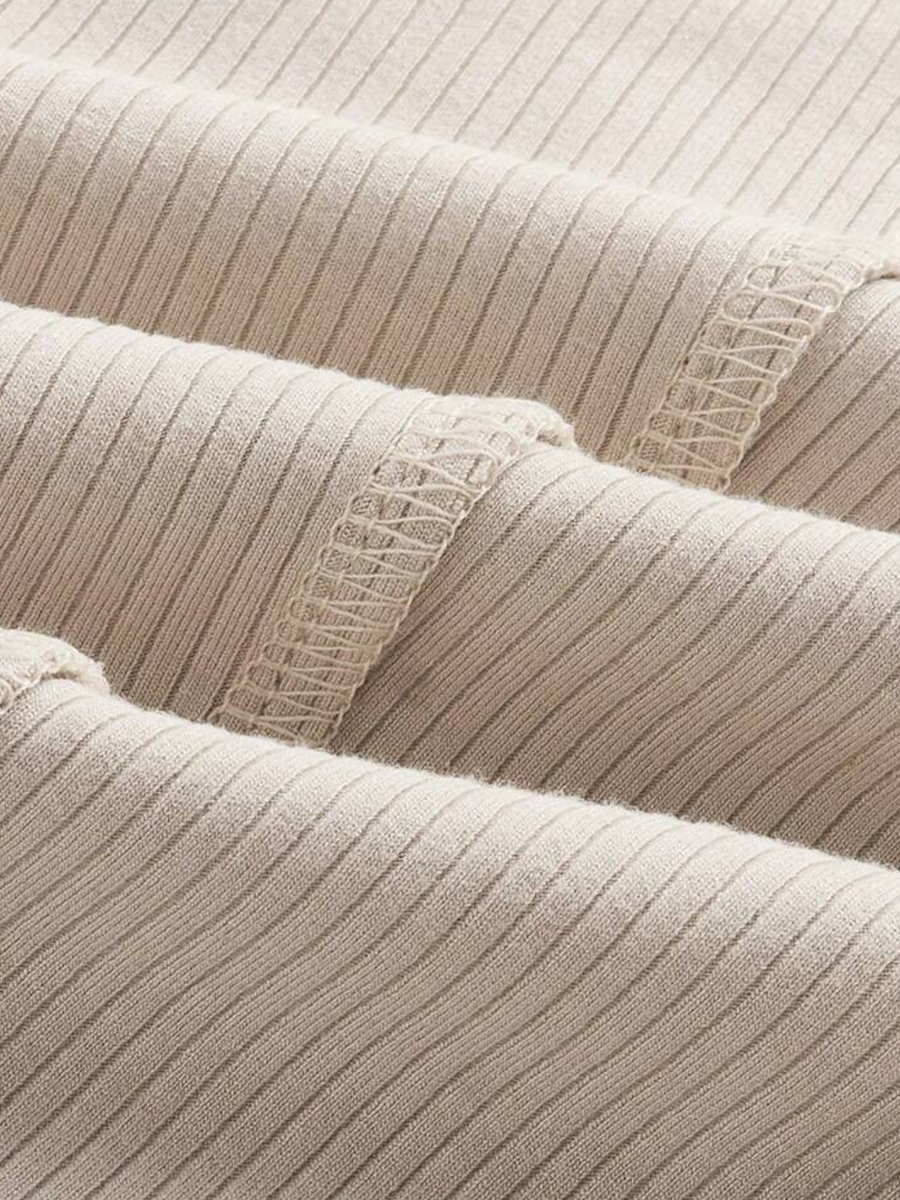 Vestido con diseño patwork de punto, unicolor con detalle de nudo delantero