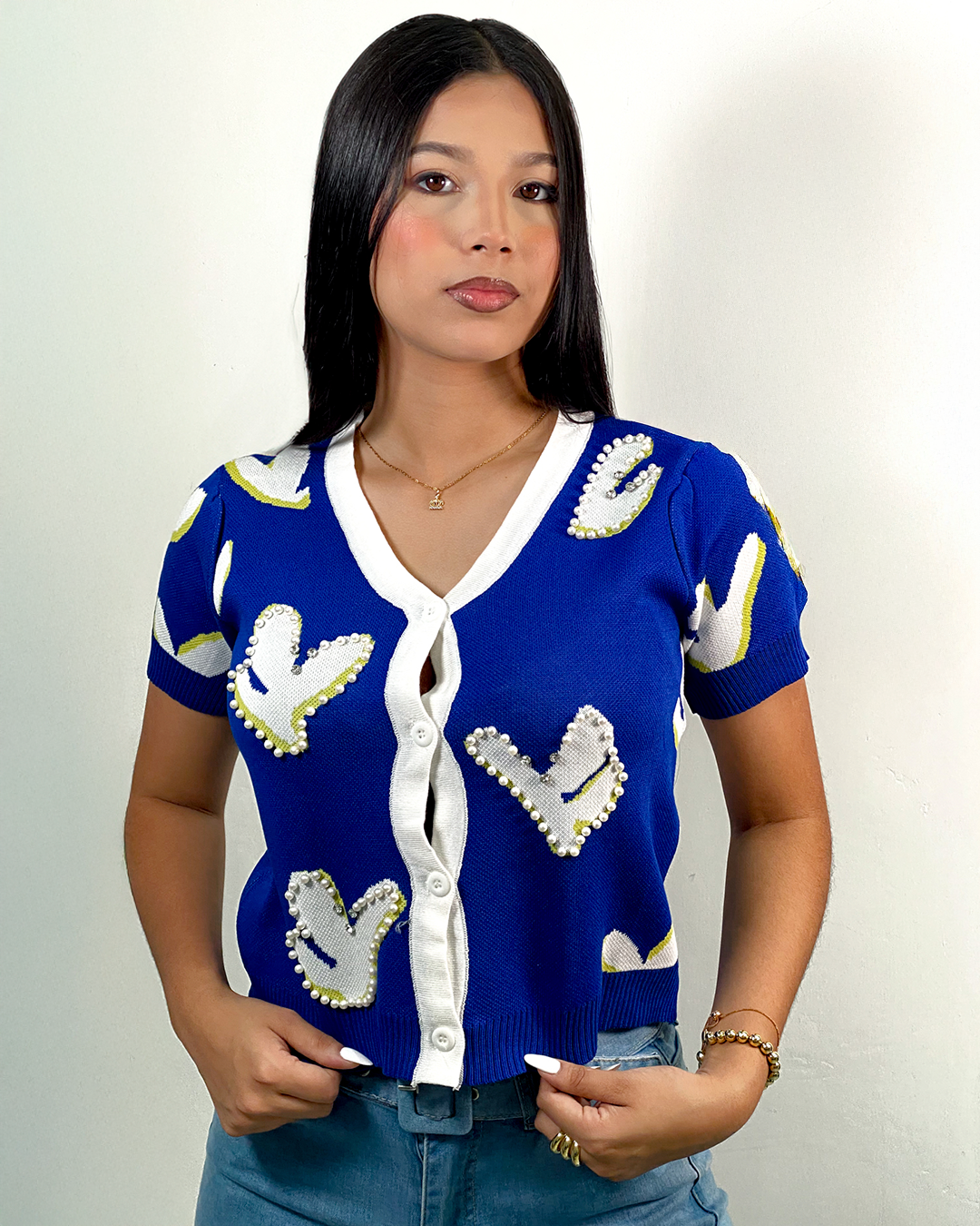 Blusa tejida con diseño de perlas