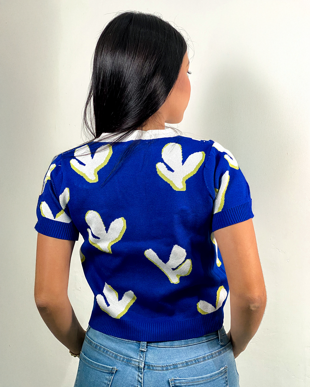 Blusa tejida con diseño de perlas