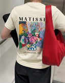 Franela unicolor con diseño grafico grande en la parte trasera de pintura - ArmasStyle