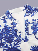 Blusa con estampado floral y mangas holgadas