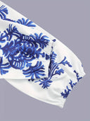 Blusa con estampado floral y mangas holgadas