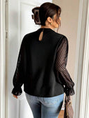 Blusa manga larga con transparencia