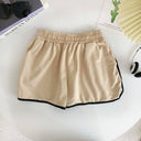 Short unicolor con lineas en los bordes
