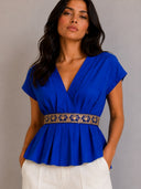 Blusa unicolor con detalle dorado