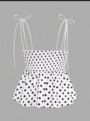 Blusa de lunares sin manga con dobladillo con volantes