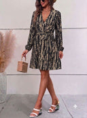Vestido manga larga estampado con cinturon