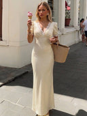 Vestido largo de seda y encaje