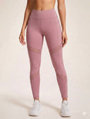 Leggins unicolor con bolsillos y malla