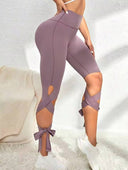 Leggins deportiva con tirantes cruzado