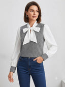 Blusa manga larga a cuadros con lazo frontal