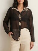 Blusa manga larga trasparente