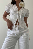 Camisa basica manga corta con nudo frontal