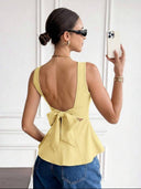 Blusa sin manga elegante y sin espalda, con lazo trasero